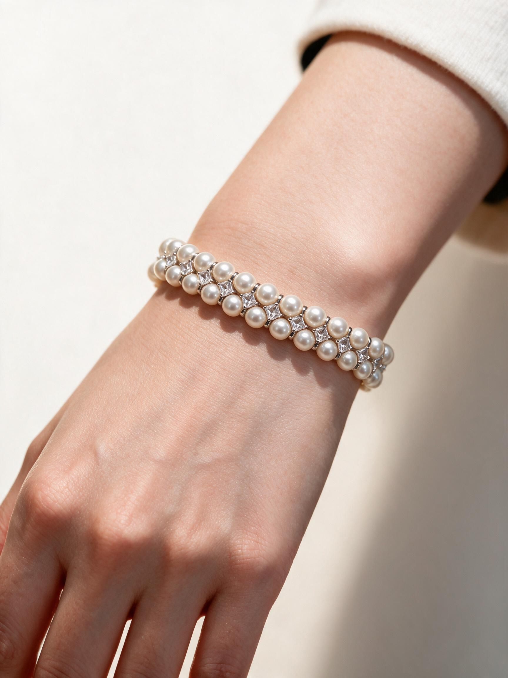SKU10004 double-strand freshwater pearl bracelet worn on wrist for scale