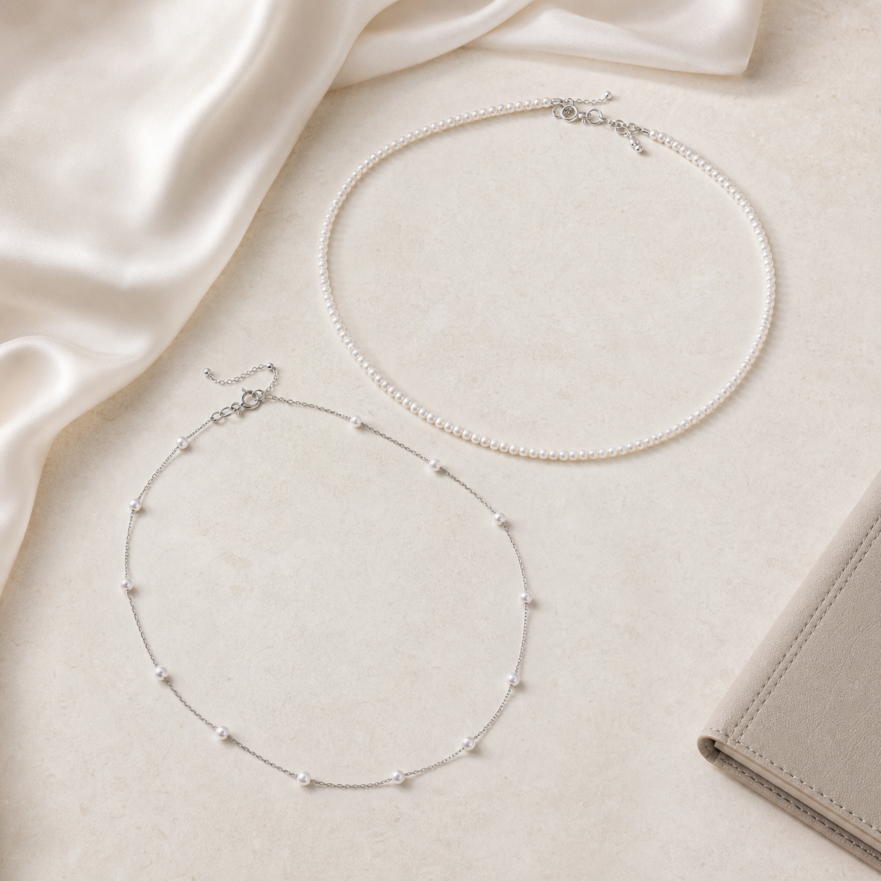 Starlight Pearl Necklace layered set styled on ivory silk and pale stone
