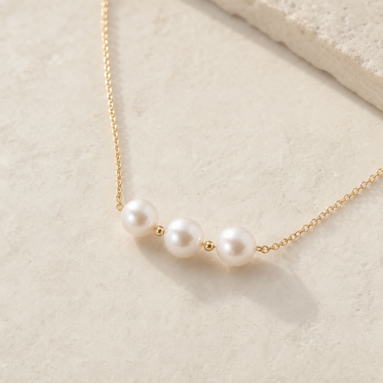 Close-up of Golden Smile freshwater pearl necklace details