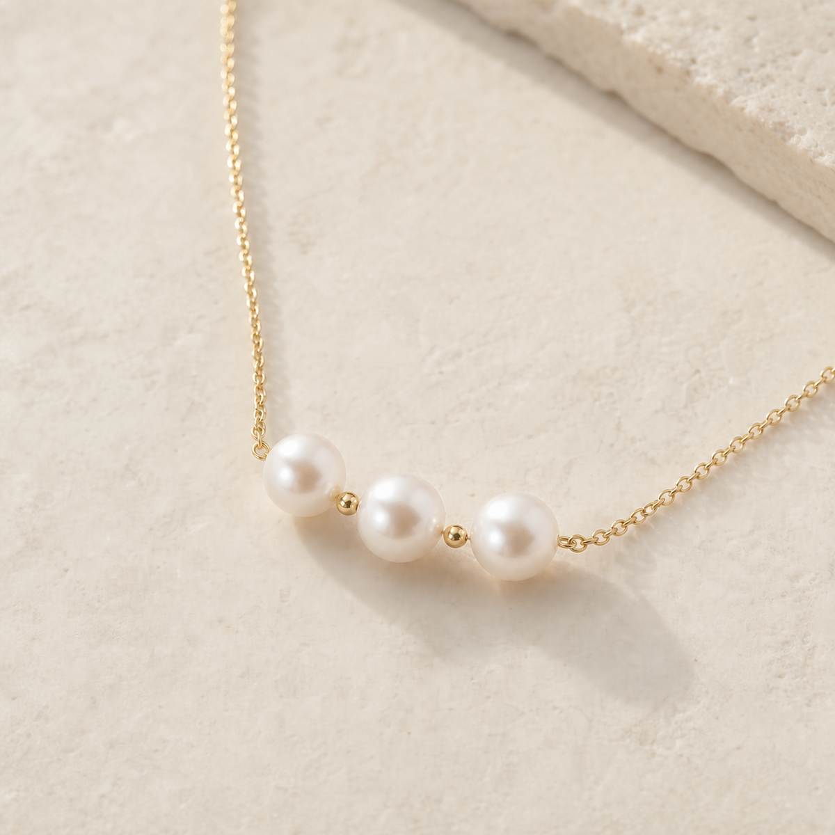 Close-up of Golden Smile freshwater pearl necklace details
